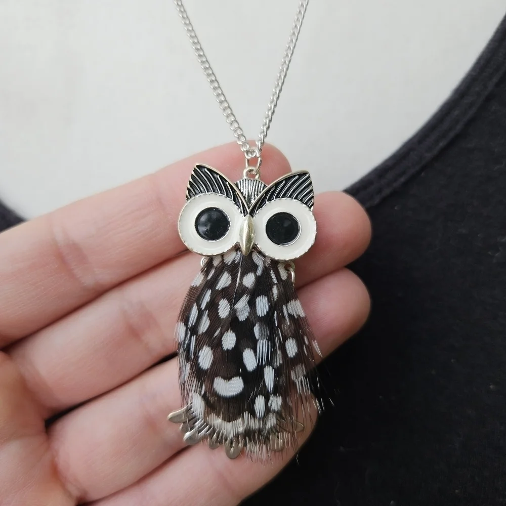 silver tone chain necklace with feathery owl pendant
